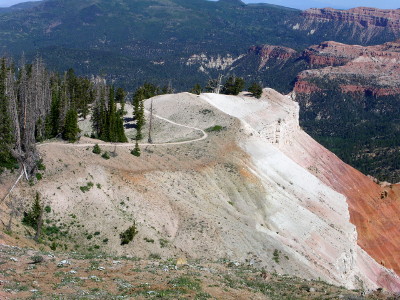 [Trail weaving across top of white-stoned, near treeless ridge to an overlook.]